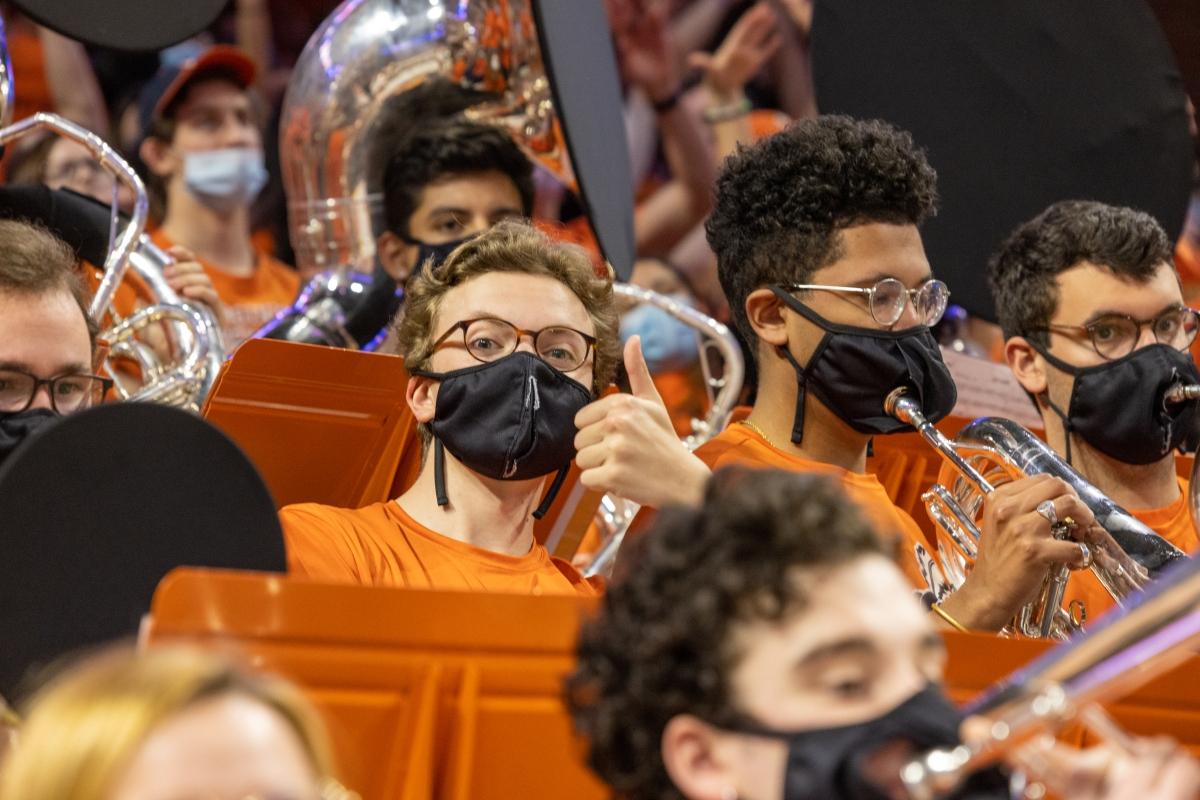 Baritone Dan Arnold gives the camera a thumbs up from the stands! (Photo Credit: Tom Pajewski)